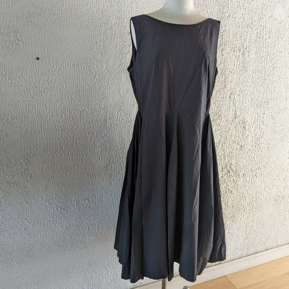 COS fit and flare black cotton poplin swing dress with pockets